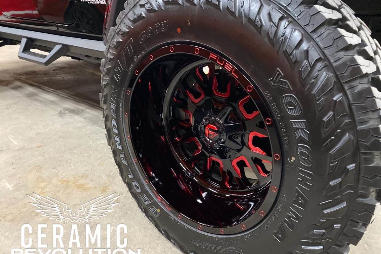 red and black jeep tires