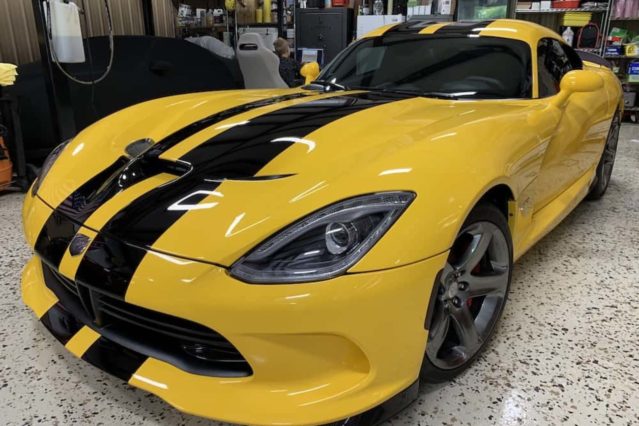 yellow and black sports car