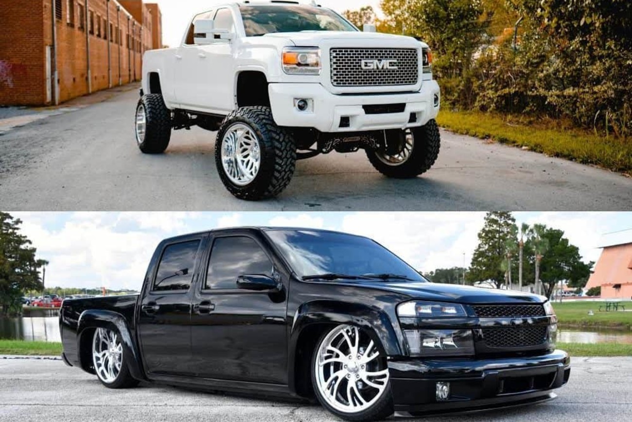 white gmc truck and black lowered truck